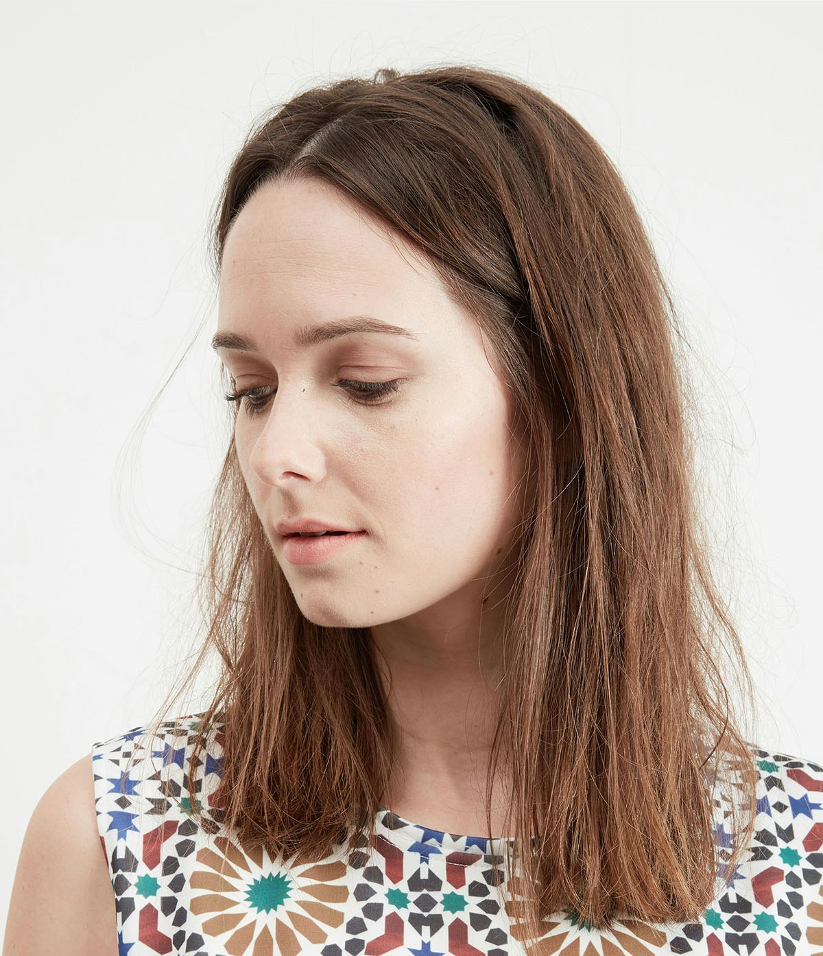 model-skin-retouching-moles-before Unedited closeup photo of model's face with moles